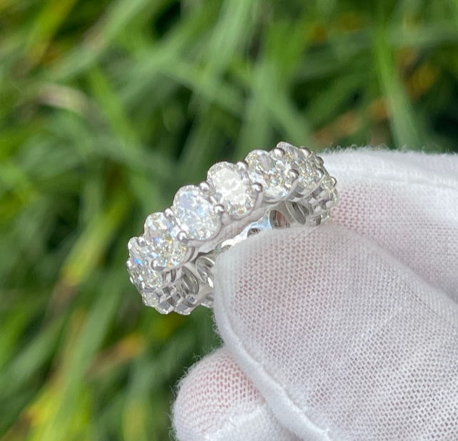 Platinum Natural 8.14 Carat Oval Diamond Eternity Ring