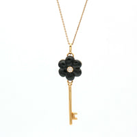 Women's Huggie Hoop Earrings with a Diamond in 14k Yellow Gold