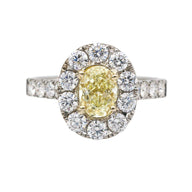 Oval Fancy Yellow Diamond Halo Engagement Ring in 18k White Gold