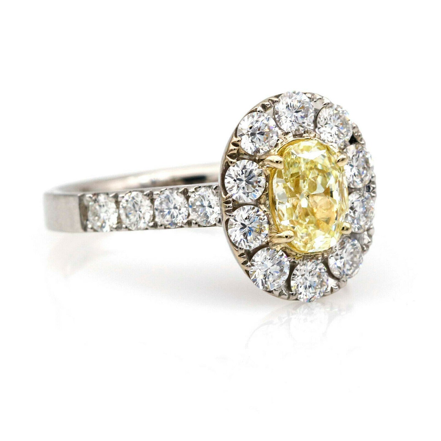 Oval Fancy Yellow Diamond Halo Engagement Ring in 18k White Gold