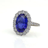 Tanzanite and Diamond Oval Halo Ring in 18k White Gold ( 14.30 cttw )