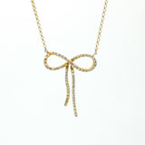 Contemporary 14K Yellow Gold Women's Diamond Infinity Bow Necklace Signed DD
