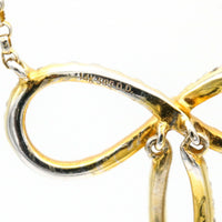 Contemporary 14K Yellow Gold Women's Diamond Infinity Bow Necklace Signed DD