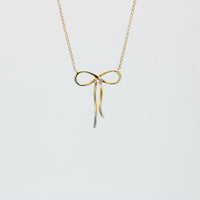 Contemporary 14K Yellow Gold Women's Diamond Infinity Bow Necklace Signed DD