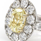 Oval Fancy Yellow Diamond Halo Engagement Ring in 18k White Gold