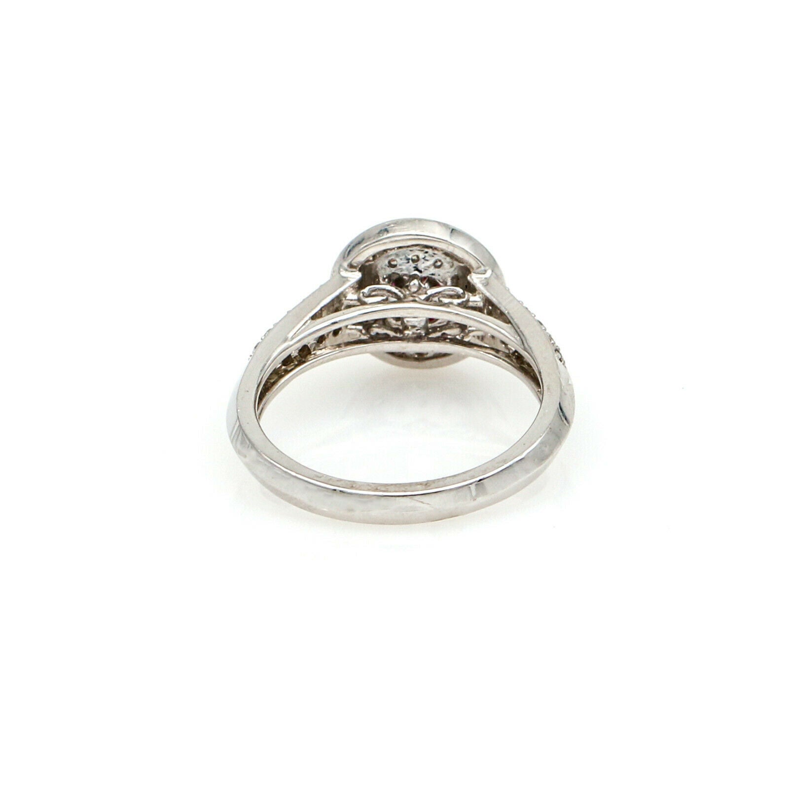 1,50 ct Ruby and Diamond Halo Engagement Ring in 14k White Gold